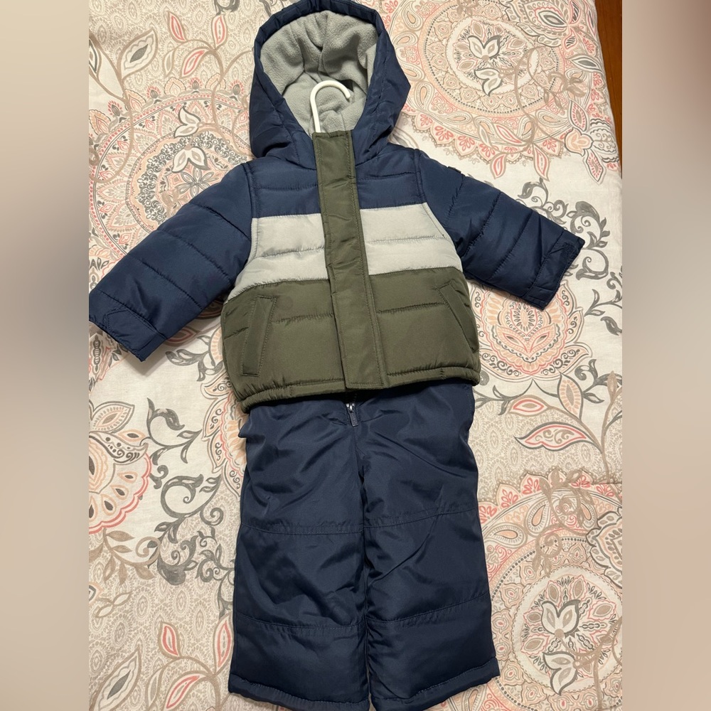 12m Carter’s snow pants and winter coat combo. Worn a handful of times. Like new
